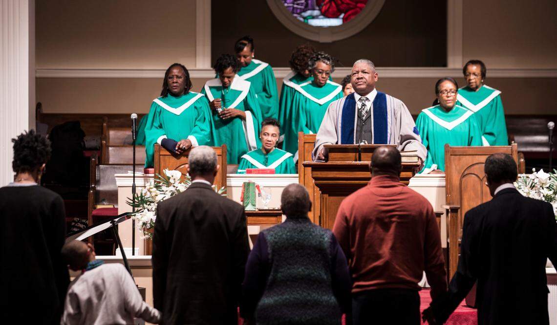 Rev. Jerome Washington, pastor of Mt. Vernon Baptist Church, looks out over the congregation during service on Sunday, Jan. 13, 2019.
