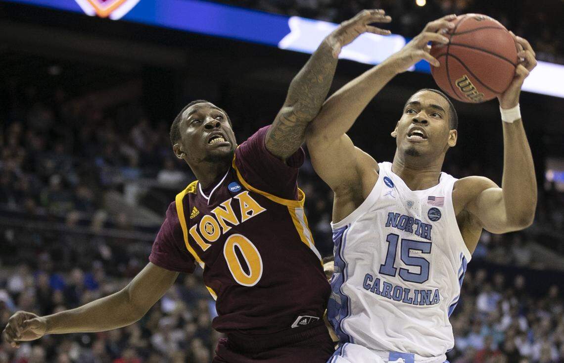 North Carolina’s Garrison Brooks (15) secures an offensive rebound from Iona’s Rickey McGill (0) during the second half on Friday, March 22, 2019 at Nationwide Arena in Columbus, Ohio.
