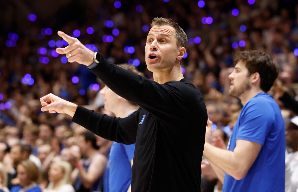 Duke’s head coach Jon Scheyer instructs his team during the first half of Duke’s game against UNC at Cameron Indoor Stadium in Durham, N.C., Saturday, March 9, 2024.