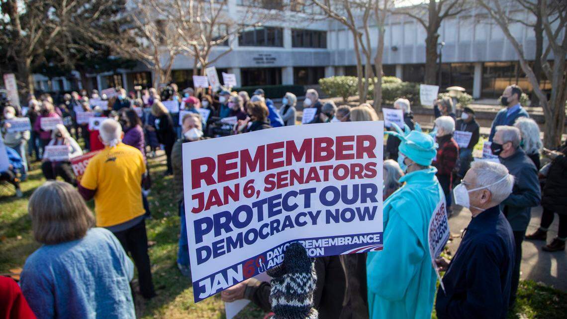 About 150 people demonstrated outside the Federal Building on New Bern Avenue in Raleigh on Jan. 6, 2022 on the one-year anniversary of the U.S. Capitol attack. Organized by the North Carolina Poor People’s Campaign, the protest urged lawmakers to pass the Freedom to Vote Act and the Protecting Our Democracy Act.