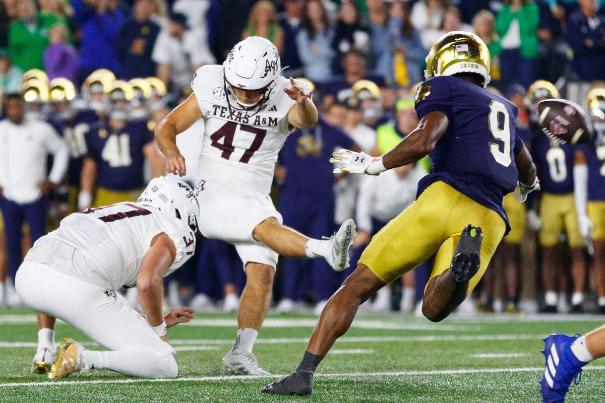 Texas A&M place kicker Randy Bond (47) kicks and scores an extra point to win a NCAA football game 41-40 against Notre Dame at Notre Dame Stadium on Saturday, Sept. 13, 2025, in South Bend.