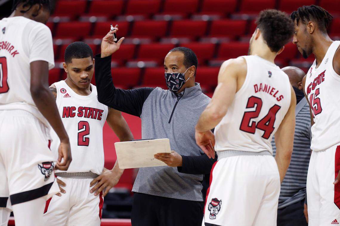 N.C. State head coach Kevin Keatts talks with his team during the second half of N.C. State’s 72-67 victory over Wake Forest at PNC Arena in Raleigh, N.C., Wednesday, January 27, 2021.