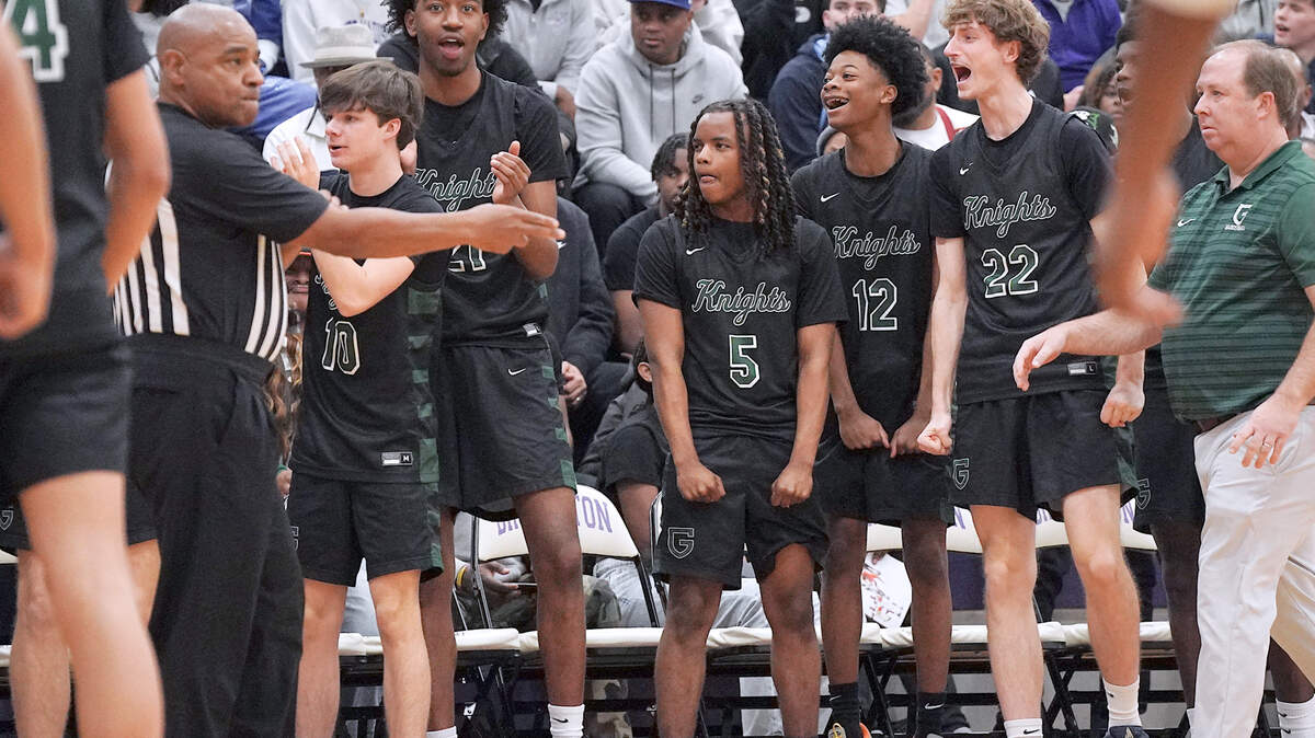 The Greenfield bench reacts to a foul against Coronado during the second half. The Greenfield Knights and the Coronado Cougars (Nevada) met in the finals of the Day'Ron Sharpe bracket of the  John Wall Holiday Tournament in Raleigh, N.C. on December 30, 2025.