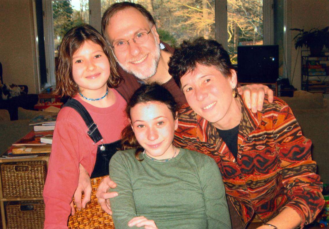 Ariel Wolf, center, and her family in a snapshot from her childhood. She had a stable, supportive home life. It was her mind that was in crisis. If Ariel had cancer or any other critical condition, her mom and dad wouldÕve been able to communicate daily with her providers, sleep in her room and comfort her. But because her child was diagnosed with bipolar disorder, Marcia Cordova Roth felt doctors viewed her and her husband suspiciously, as if they were the cause of the problem.