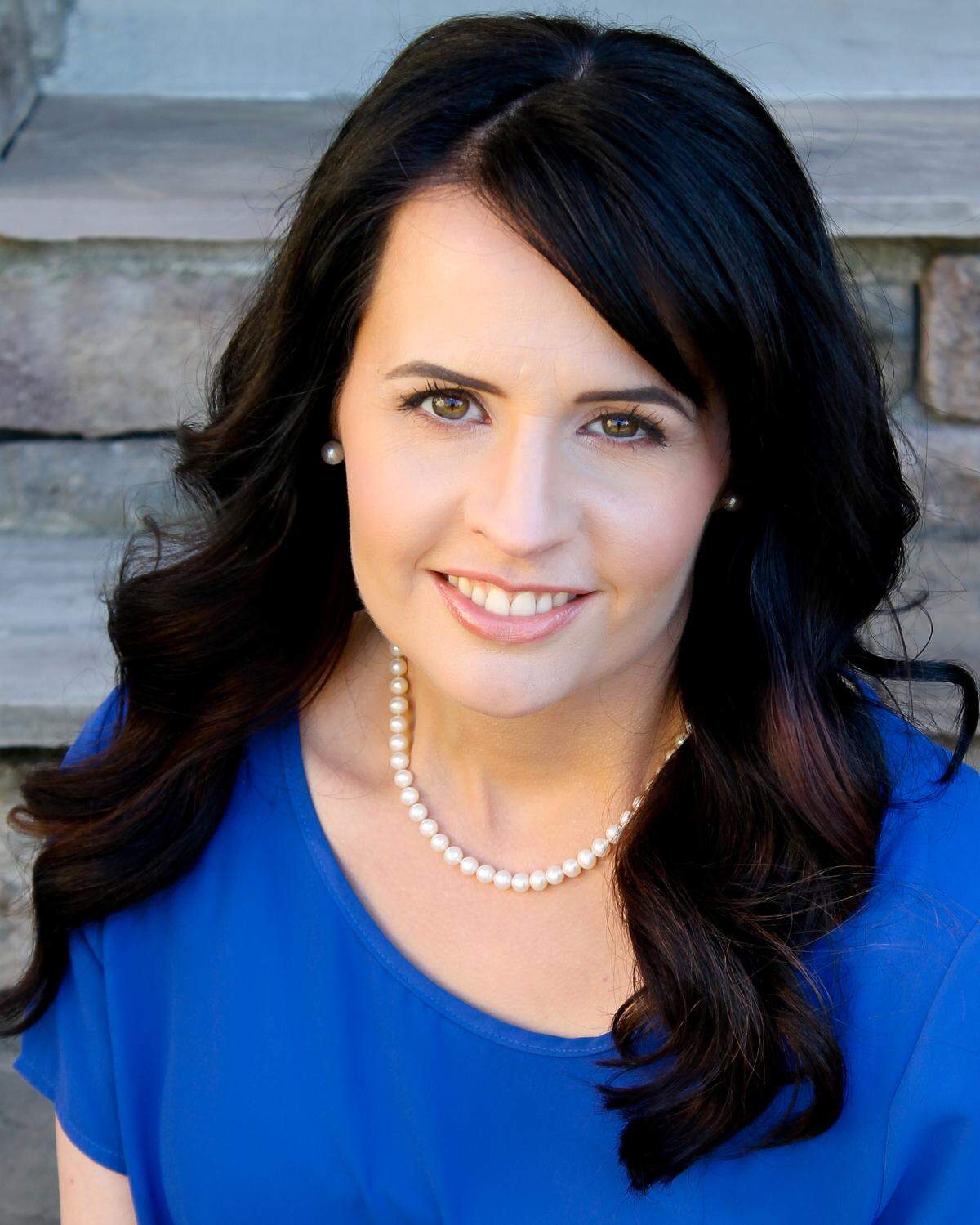 Camille Andros of Chapel Hill is the author of “The Dress and the Girl.”