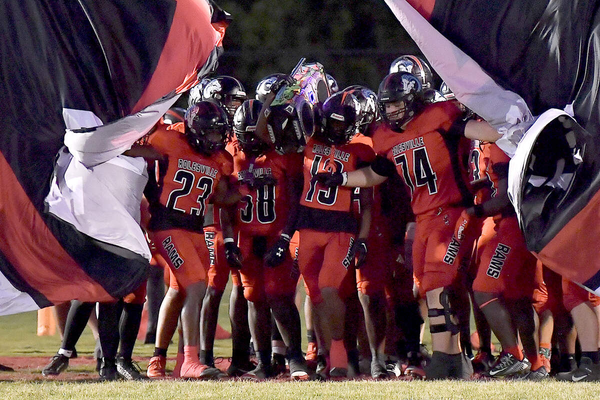 The Rolesville Rams march onto their field before their game against Millbrook in Rolesville. The Rolesville Rams and the Millbrook Wildcats met in a football game in Raleigh. N.C. on October 11, 2024.
