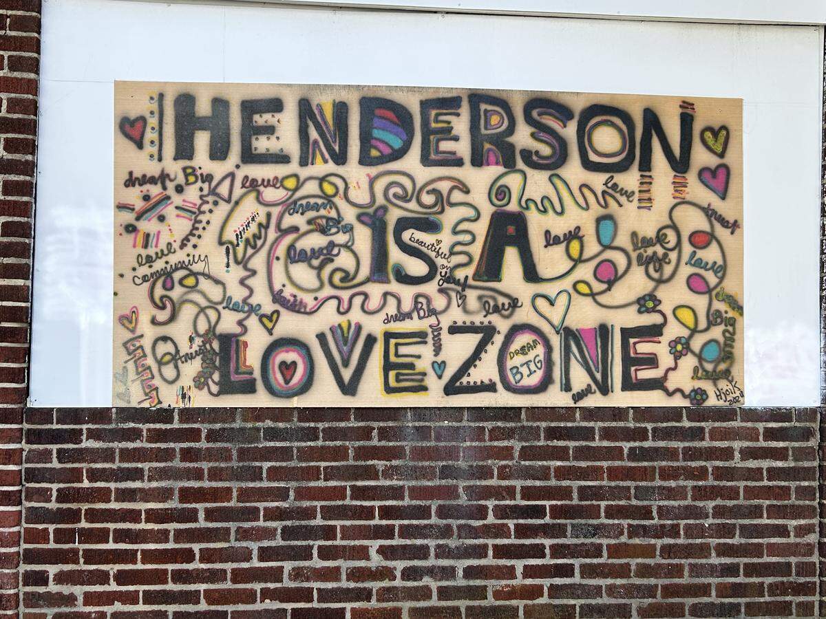 A sign in downtown Henderson, NC