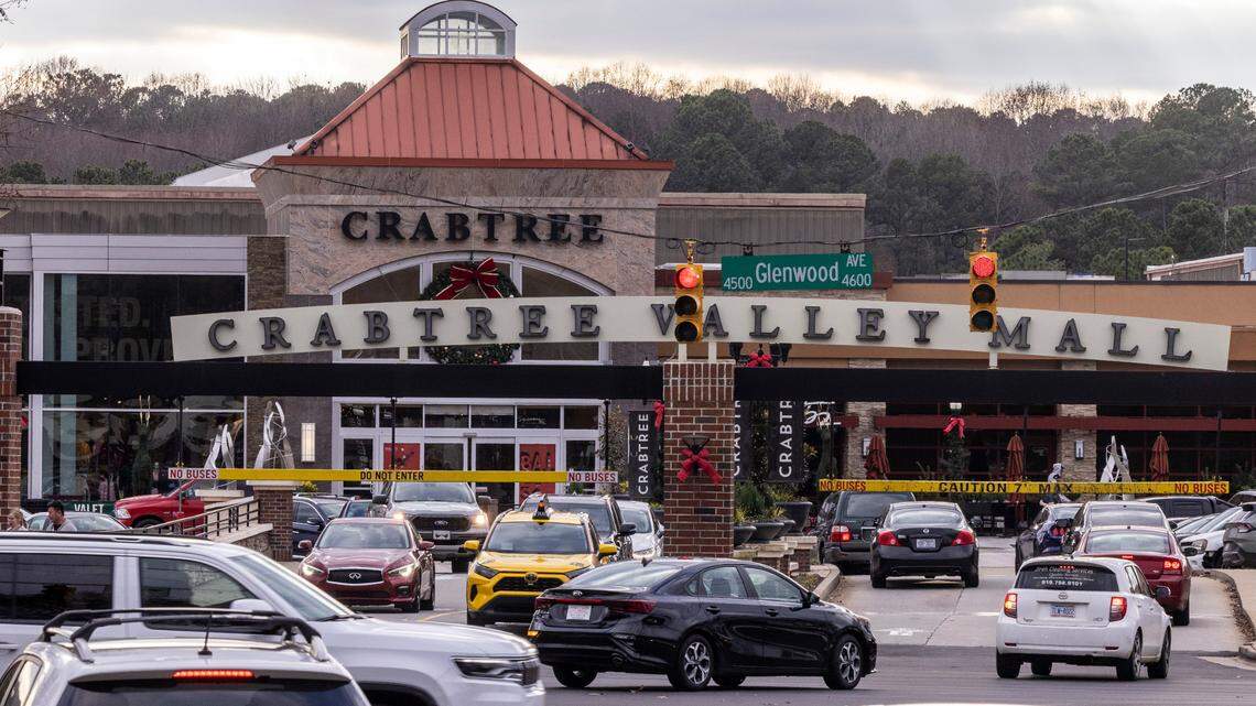 Holiday shoppers drive through the entrance of Crabtree Valley Mall on Glenwood Avenue in Raleigh Monday, Dec 12, 2022. The mall has been for sale on the market for nearly a year.