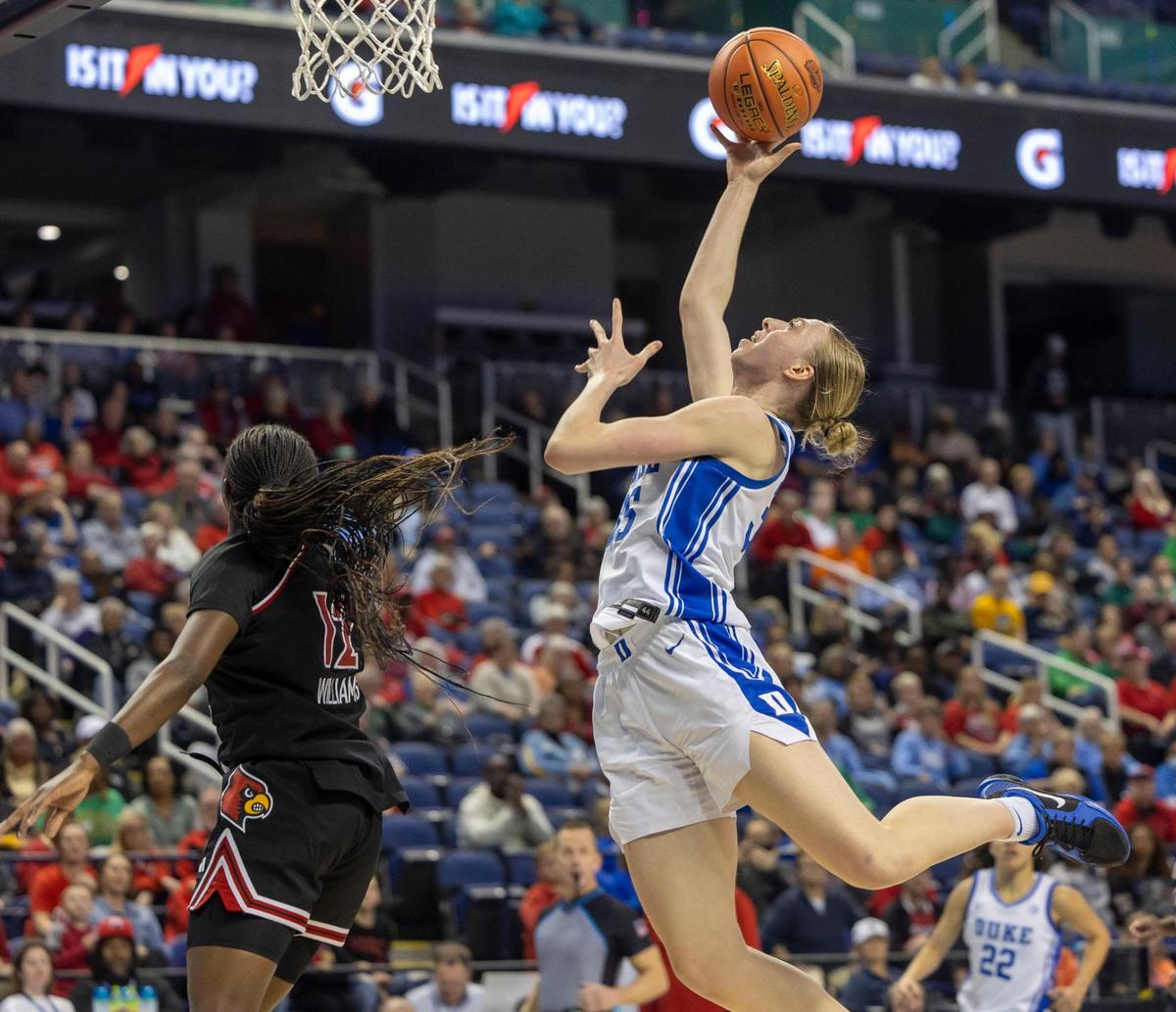 Duke’s Toby Fournier (35) puts up a shot against Louisville’s Ja’Leah Williams (12) in the first half on Friday, March 7, 2024 during the quarterfinals of the ACC Women’s Tournament in Greensboro, N.C.
