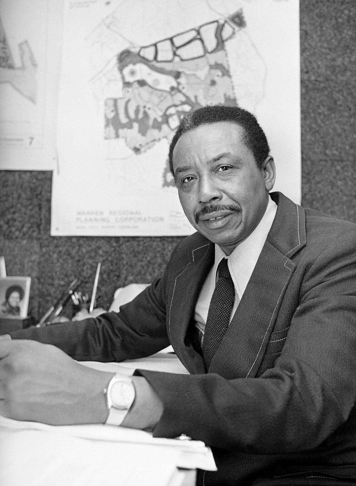 In this file photo, Floyd McKissick, former national director of the Congress of Racial Equality and now a developer of Soul City, sits in his Soul City, N.C., office, April 3, 1974.