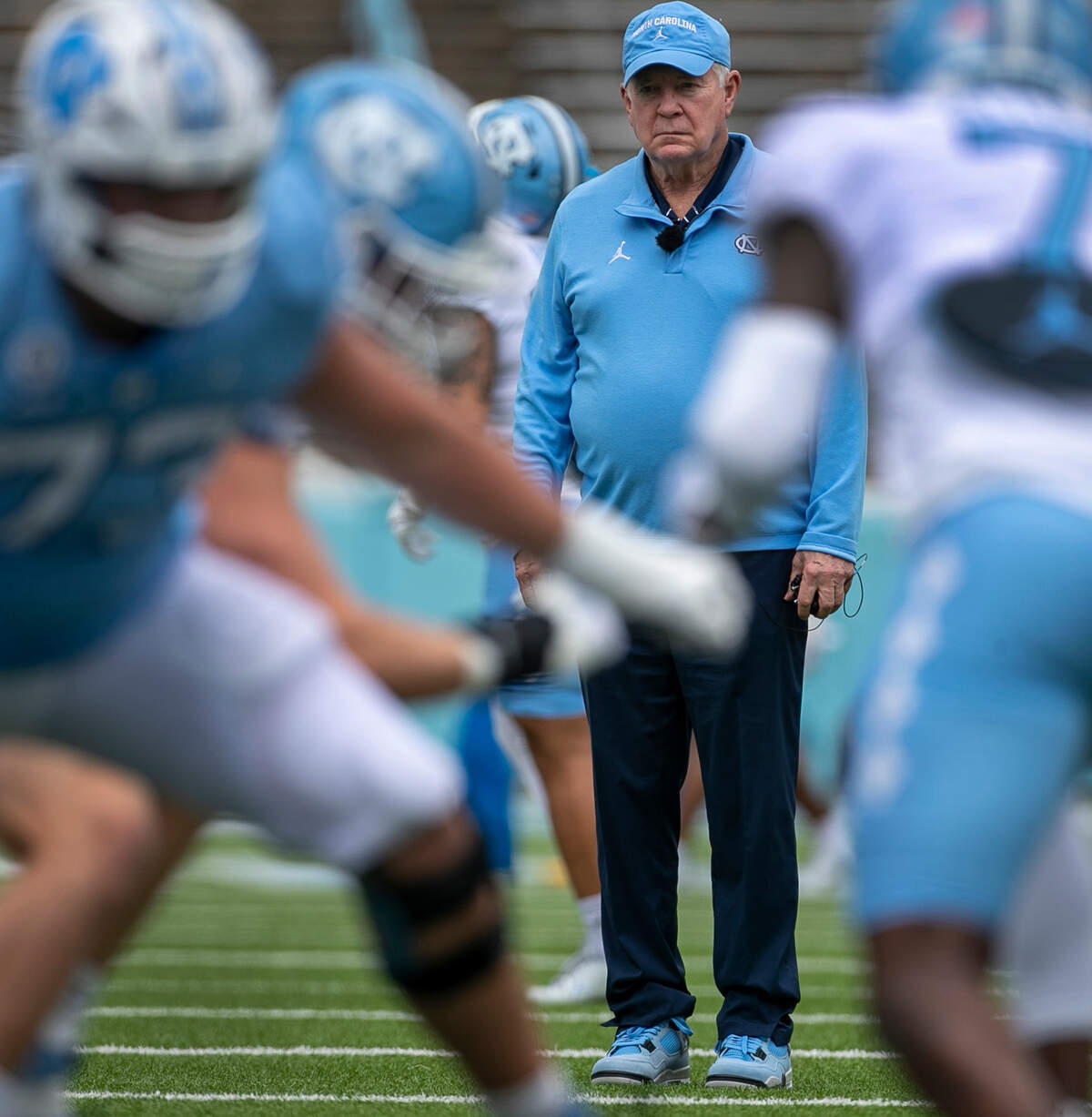 North Carolina head coach Mack Brown watches his offensive line warm up prior to their spring football game on Saturday, April 15, 2023 at Kenan Stadium in Chapel Hill, N.C.