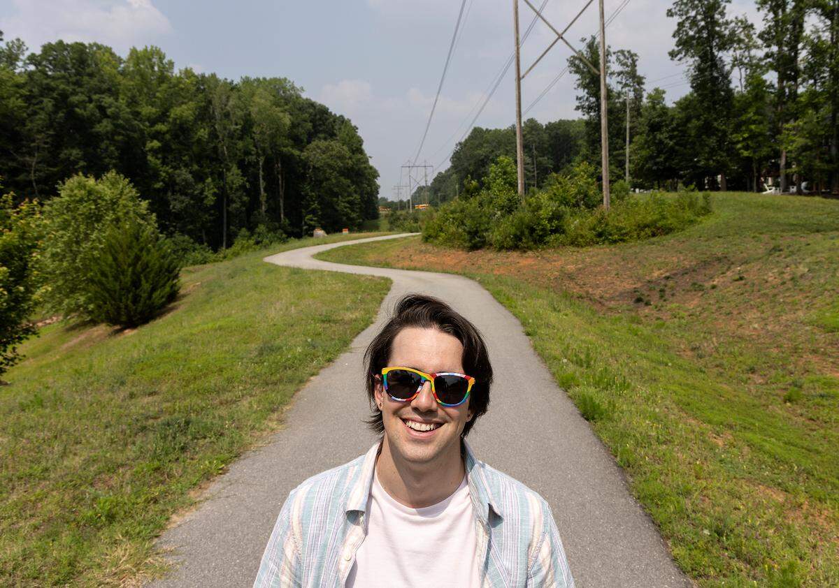 Woody Rini, who identifies as non-binary and uses they/them pronouns, is photographed in Cary, N.C. on Thursday, June 29, 2023.