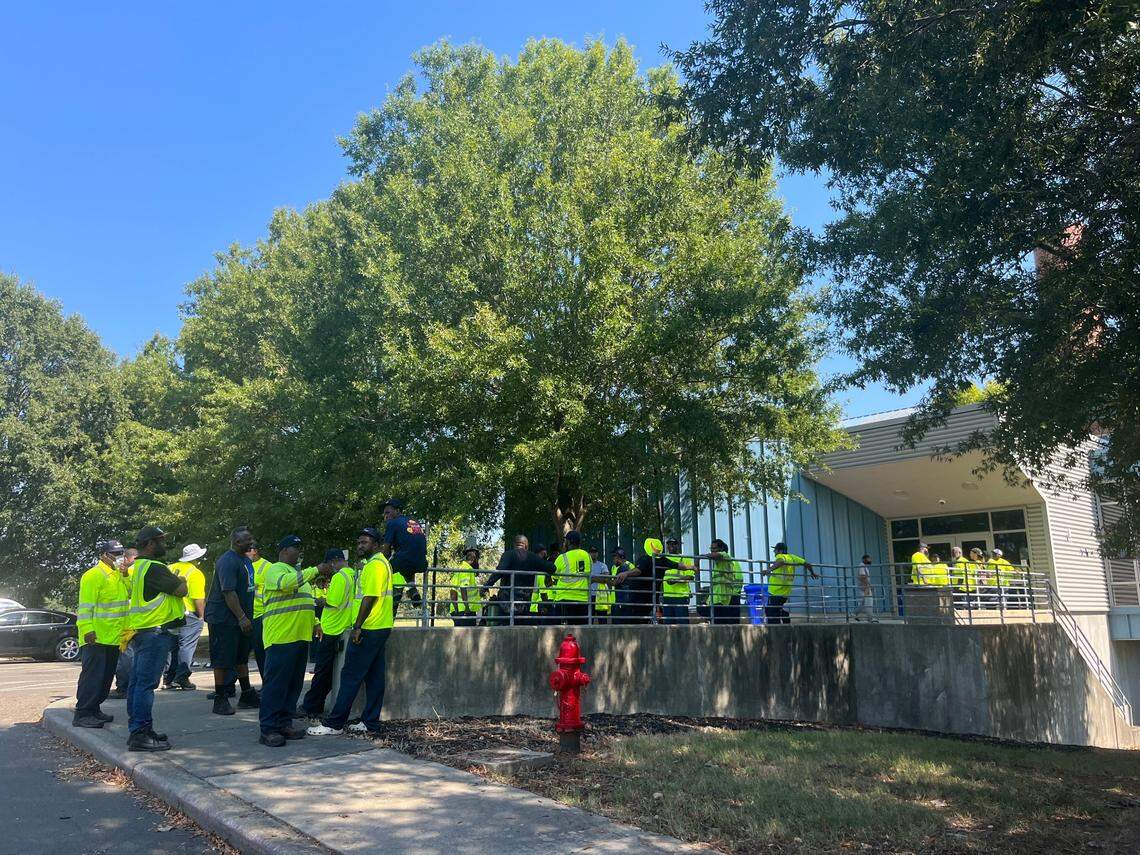 Durham city employees outside the Solid Waste Operations Facility, where they refused to load their trucks on Sept. 6, 2023. They are calling for better pay.