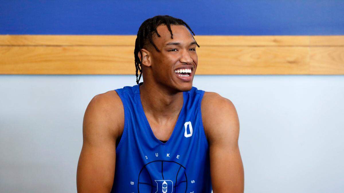 Duke’s Wendell Moore Jr. smiles as he answers a question during Duke men’s basketball media day in Durham, N.C., Tuesday, September 28, 2021.