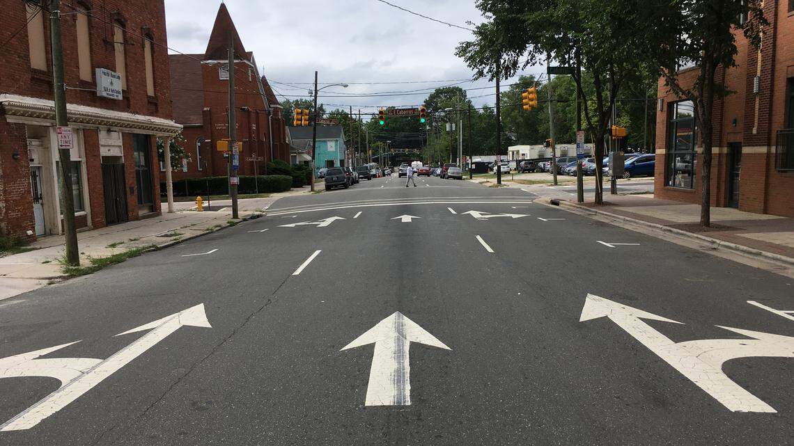 Blount Street, shown here at the intersection with Cabarrus Street, and Person Street will soon be reduced from three lanes to two in downtown Raleigh, in part to make room for bicycle lanes.