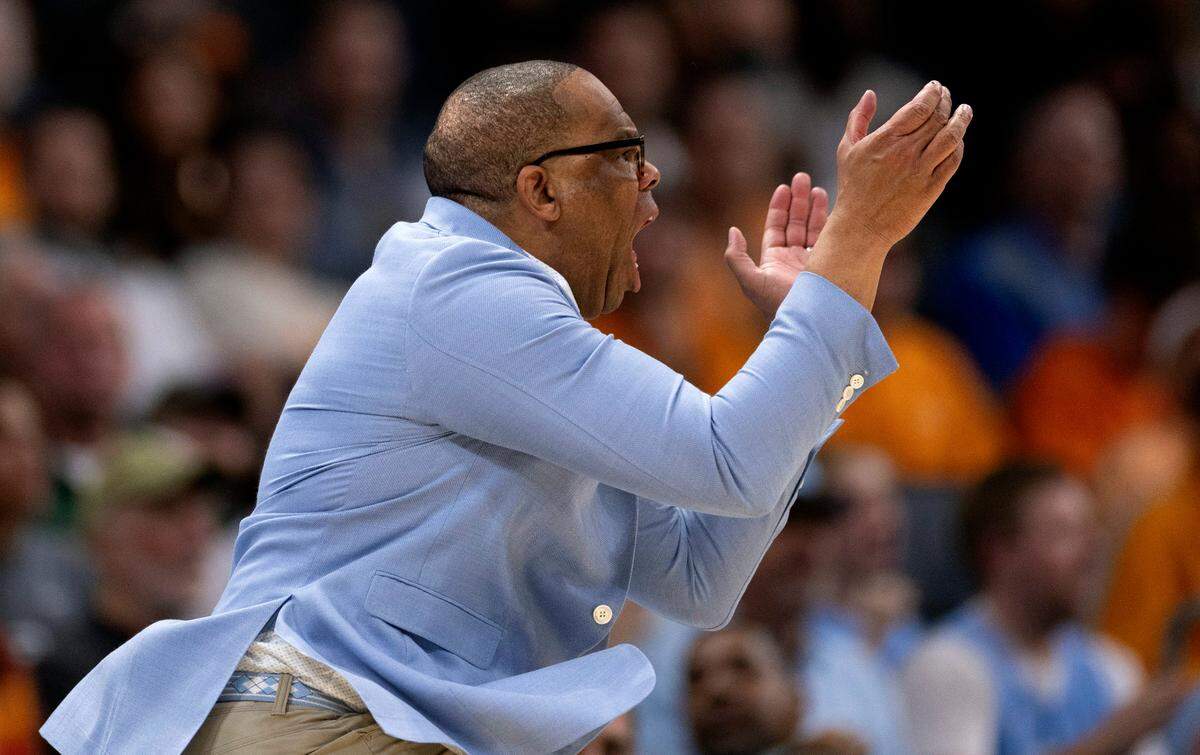 North Carolina coach Hubert Davis applauds his team on defense after taking a commanding lead during the second half against Michigan State on Saturday, March 23, 2024 during the second round of the NCAA Tournament at Spectrum Center in Charlotte, N.C.