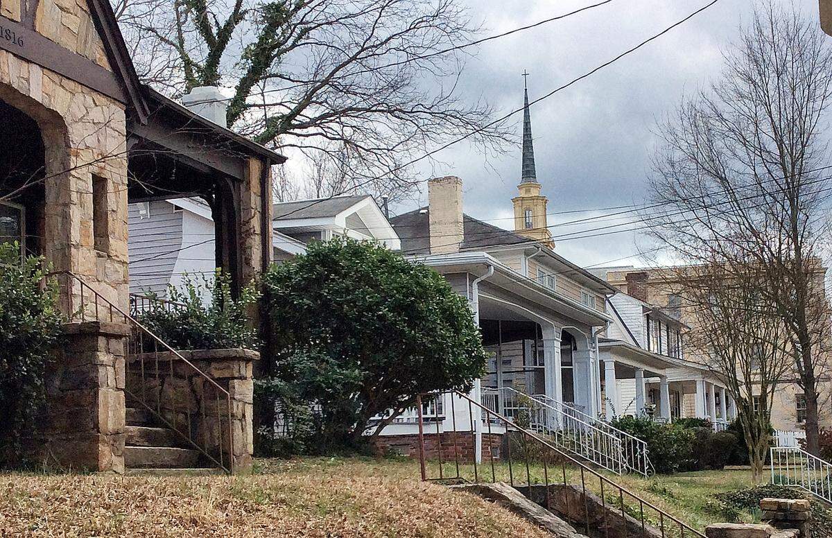 Three of the homes behind Hayes Barton Baptist Church will be demolished and three saved to use as affordable housing.