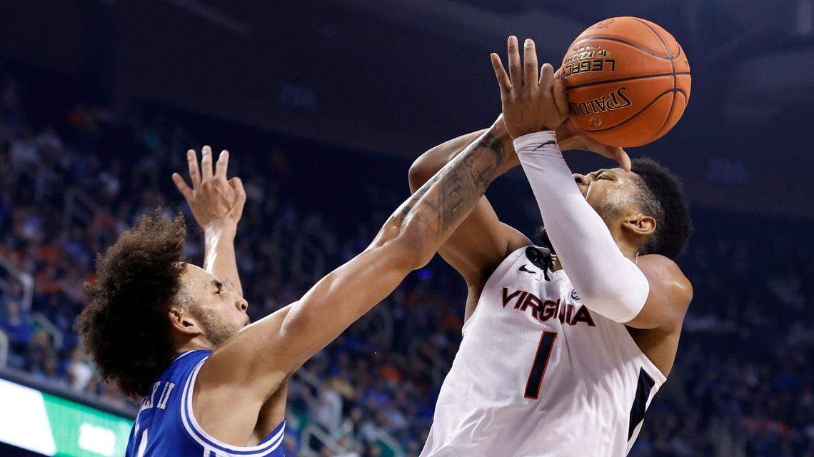 Duke’s Dereck Lively II (1) blocks the shot by Virginia’s Jayden Gardner (1) during the first half of Duke’s game against Virginia in the finals of the ACC Men’s Basketball Tournament in Greensboro, N.C., Saturday, March 11, 2023.