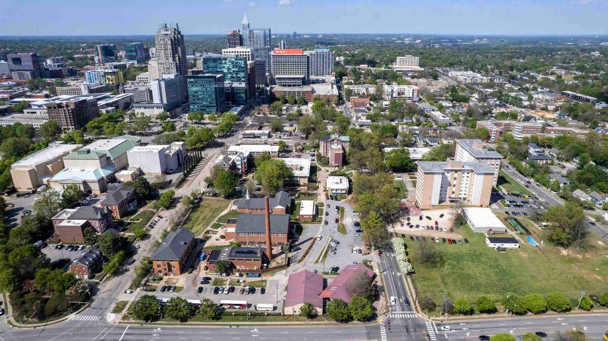 An aerial view of Shaw University campus, lower foreground, in relation to downtown Raleigh Tuesday, April 4, 2023. University leaders want to rezone about 26 acres of the downtown Raleigh property to allow taller, denser buildings.