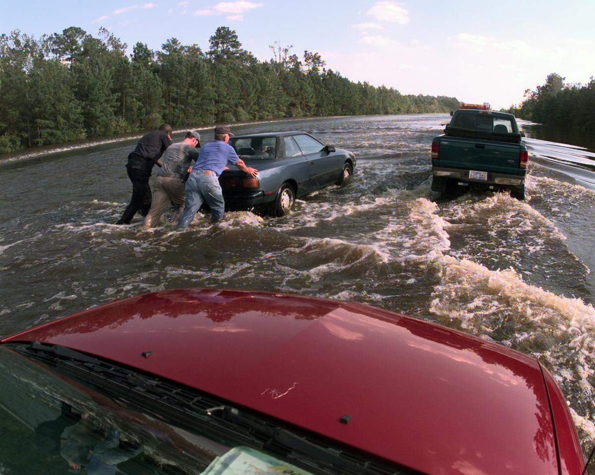 Many motorist were stalled in rising creek waters flowing over I-40 during Hurricane Floyd in 1999.