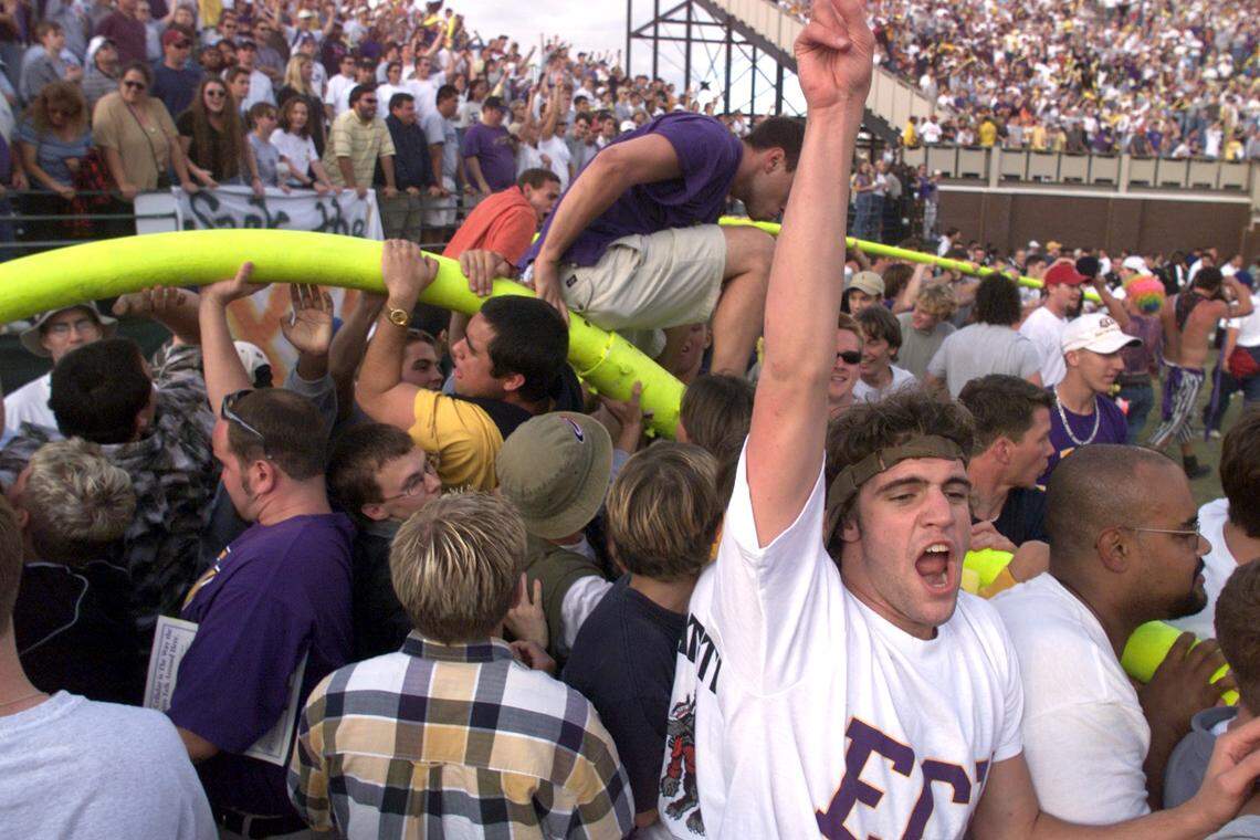 ECU fans tear down the goalposts after the Pirates defeated N.C. State 23-6 in Greenville in 1999.