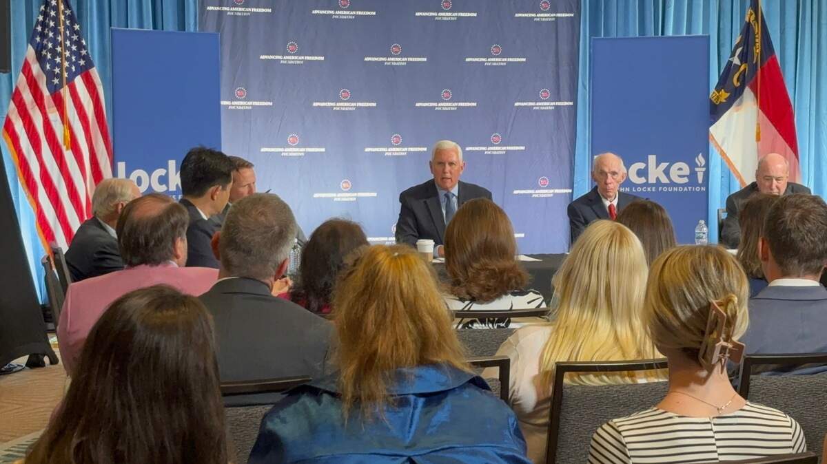 Former Vice President Mike Pence speaks about the Trump administration’s tariff and trade policy alongside North Carolina business leaders at an event in Raleigh on May 19, 2025.