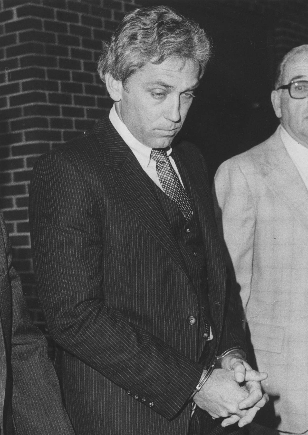 Dr. Jeffrey MacDonald is led from the Federal Courthouse in Raleigh, N.C. after being convicted August 30, 1979 of the murders of his wife and two daughters in 1970.