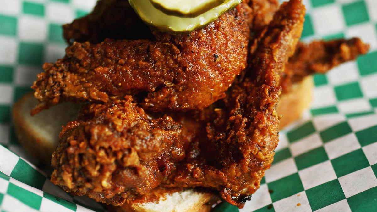The chicken at Spike’s Hot Chicken & Dogs is offered in five heat levels ranging from Teddy Bear to Hunk of Burning Love, and is available in a variety of combinations from wings to a quarter bird (light or dark meat). Served Nashville style on a slice of white bread with pickle chips, plates also come with your choice of two sides,