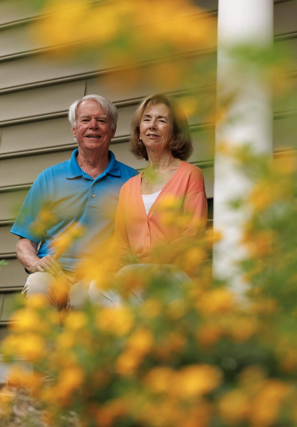Jesse and Barbara Fearrington pose for a portrait outside their home in Galloway Ridge on Tuesday, June 9, 2026. The Fearringtons accepted a spot at the Pittsboro continuing care retirement community during the COVID-19 pandemic.