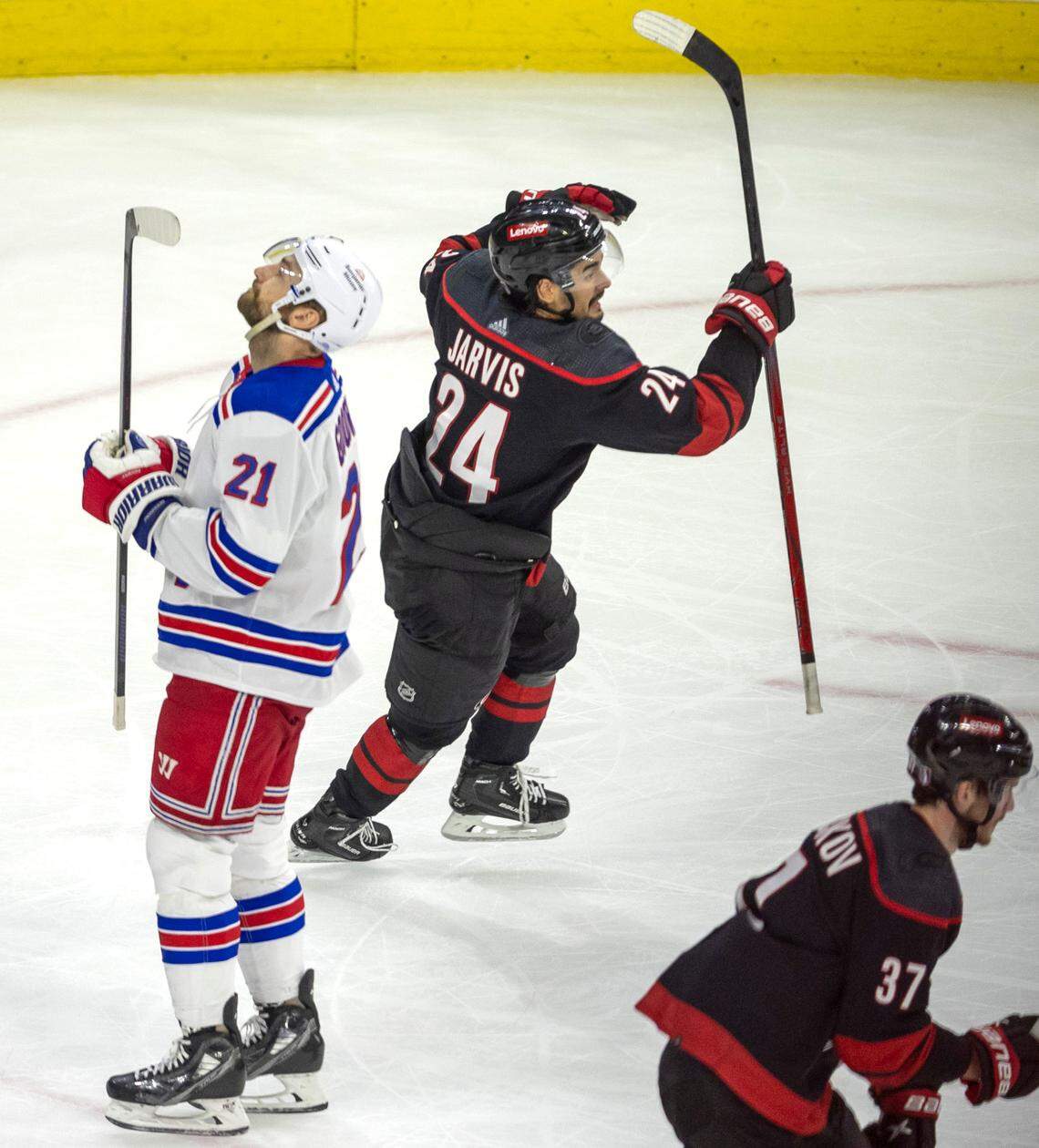 Carolina Hurricanes center Seth Jarvis (24) celebrates after the game winning goal by Brady Skjei in the third period to secure a 4-3 victory over the New York Rangers during Game 4 in the second round of the 2024 Stanley Cup playoffs on Saturday, May 11, 2024 at PNC Arena, in Raleigh N.C.