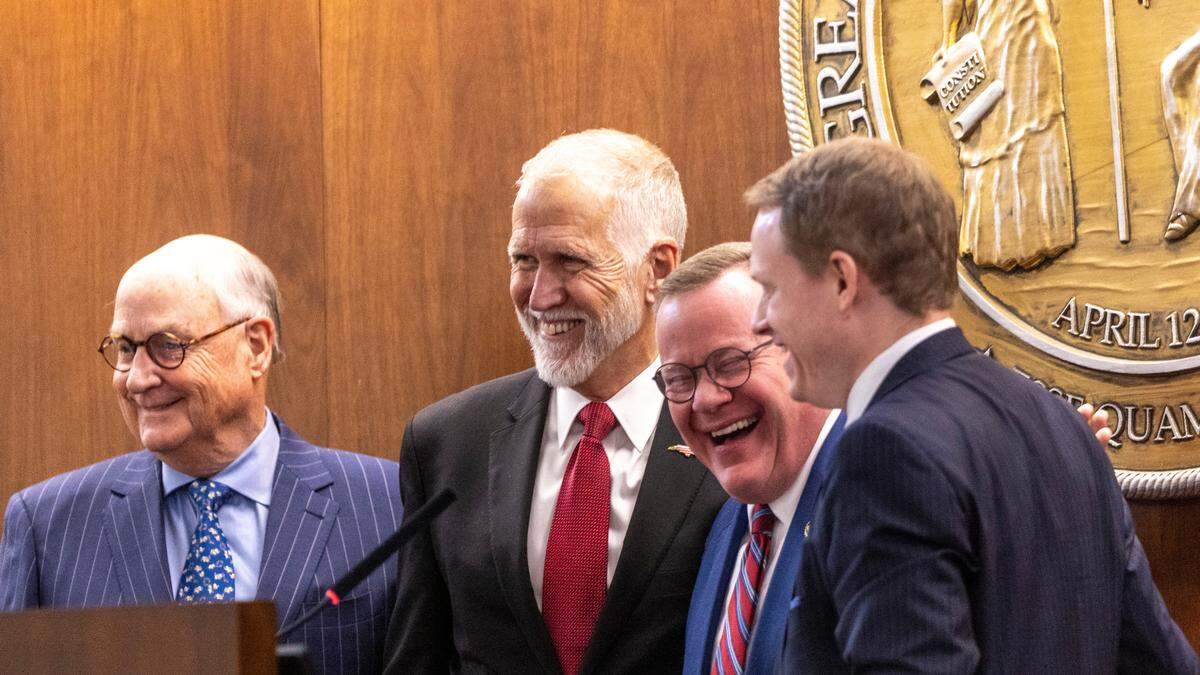 From left, former North Carolina House Speakers Harold Brubaker, U.S. Sen. Thom Tillis, and U.S. Rep. Tim Moore pose for a photo with newly elected House Speaker Destin Hall during the North Carolina General Assembly’s first 2025 legislative session on Wednesday, Jan. 8, 2025, at the Legislative Building.