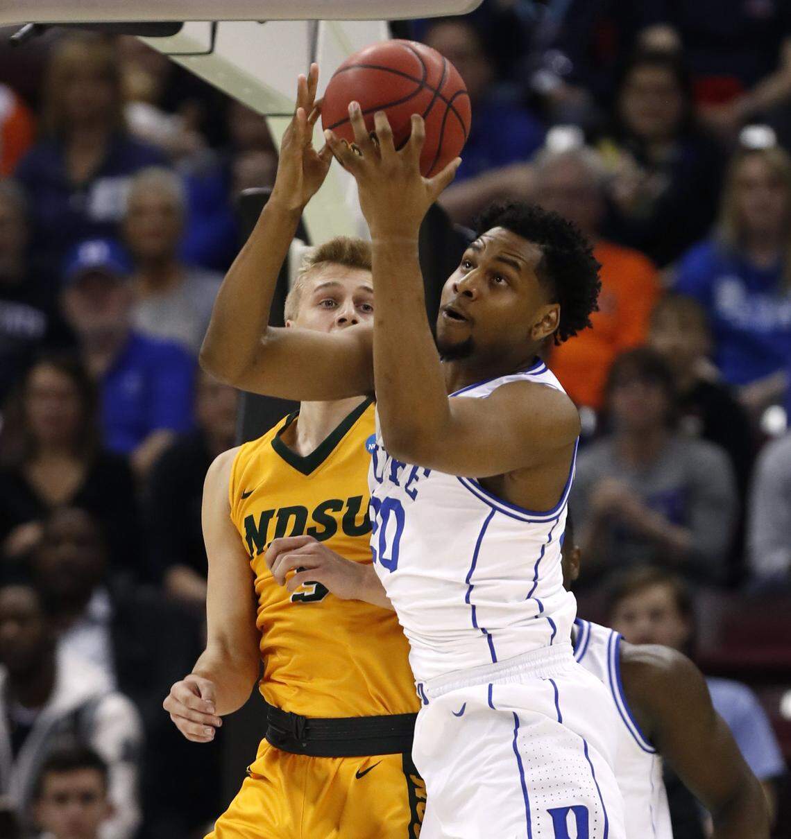 Duke’s Marques Bolden (20) pulls in a rebound in front of North Dakota State’s Sam Griesel (5) during the first half of Duke’s game against North Dakota State in the first round of the NCAA Men’s Basketball Championship in Columbia, S.C., Friday, March 22, 2019.