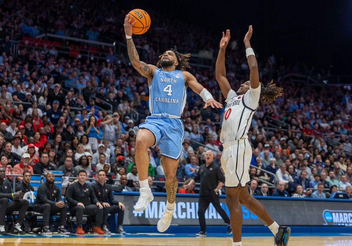North Carolina guard R.J. Davis (4) drives to the basket against San Diego State’s B.J. Davis (10) in the first half during the NCAA First Four on Tuesday, March 18, 2025 at the University of Dayton Arena in Dayton, Ohio.