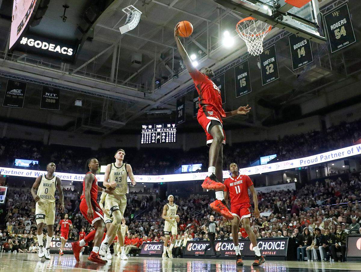 N.C. State’s Mohamed Diarra (23) elevates for a dunk during the first half of the Wolfpack’s 83-79 loss to Wake Forest on Saturday, Feb. 10, 2024, at Lawrence Joel Veterans Memorial Coliseum in Winston-Salem, N.C.