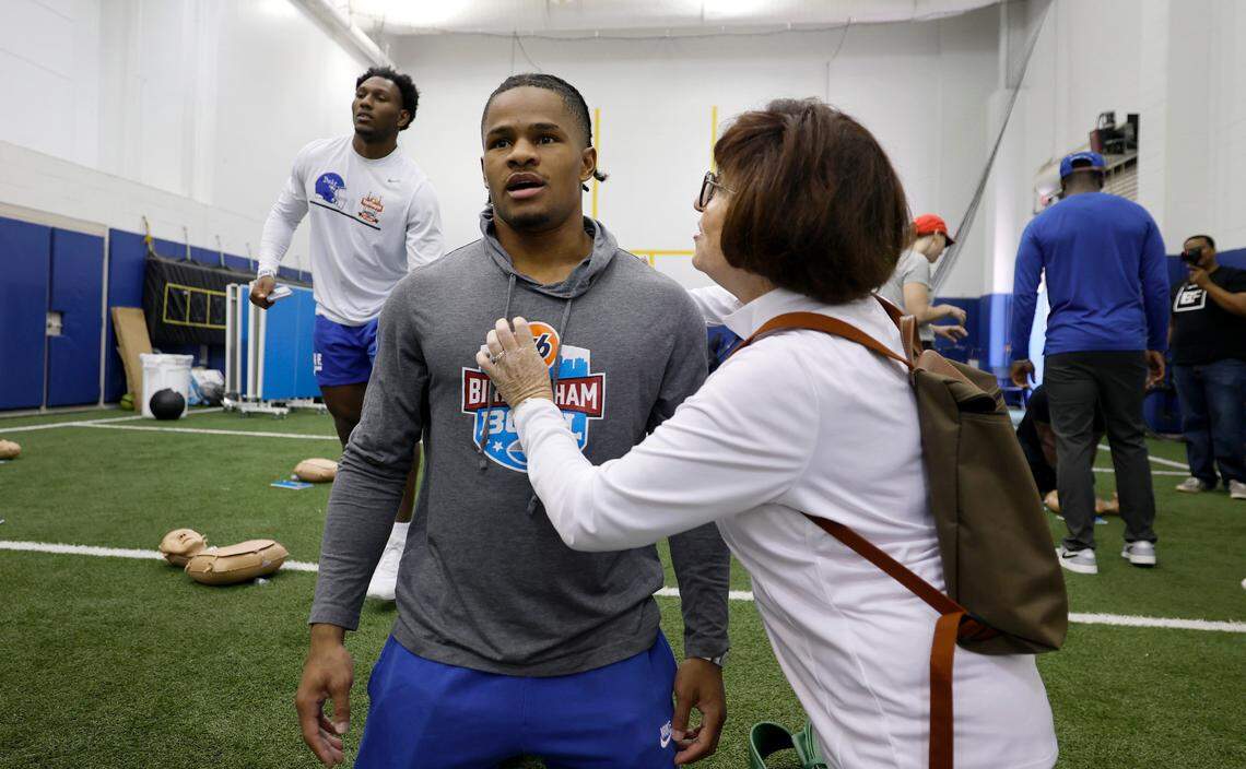 Maureen O’Keeffe works with Duke cornerback Chandler Rivers on CPR training at the Yoh Football Building in Durham, N.C., Tuesday, July 22, 2025. The football team received the CPR training by members of the American Heart Association of the Triangle and Eastern North Carolina.