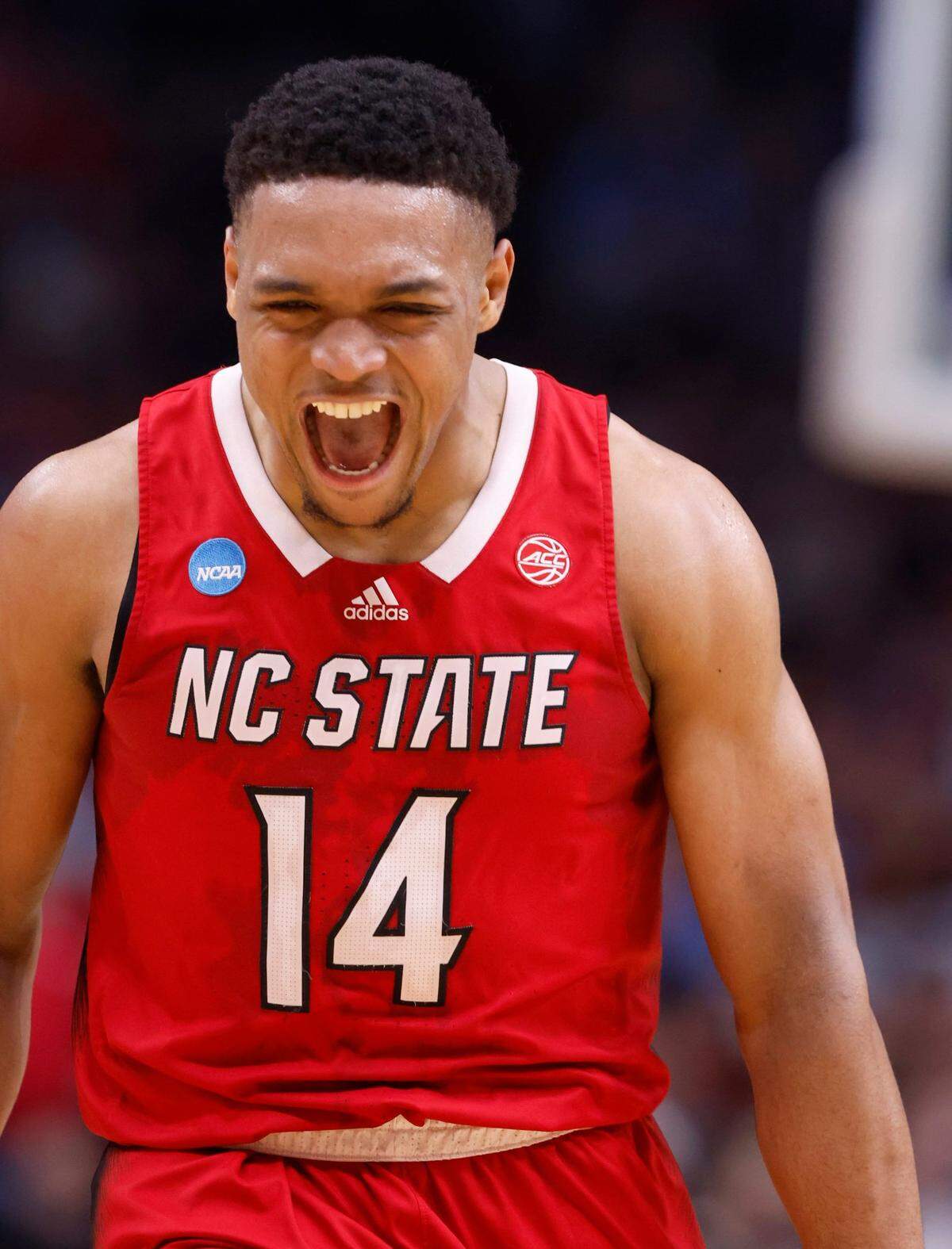 N.C. State’s Casey Morsell (14) celebrates during the first half of N.C. State’s game against Marquette in their NCAA Tournament Sweet 16 game at the American Airlines Center in Dallas, Texas, Friday, March 29, 2024.