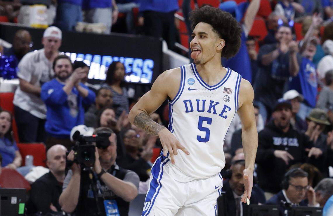 Duke’s Tyrese Proctor (5) celebrates after hitting a three-pointer during the first half of Duke’s game against Baylor in the second round of the 2025 NCAA men’s basketball championship at the Lenovo Center in Raleigh, N.C., Sunday, March 23, 2025.