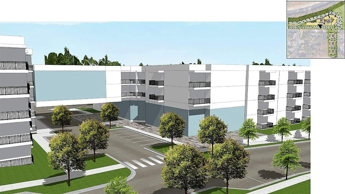 A two-story “porte-cochère,” or covered driveway, through the apartment building provides more access to parking and amenities, but also is meant to break up the visual mass of the four- and five-story apartment building.