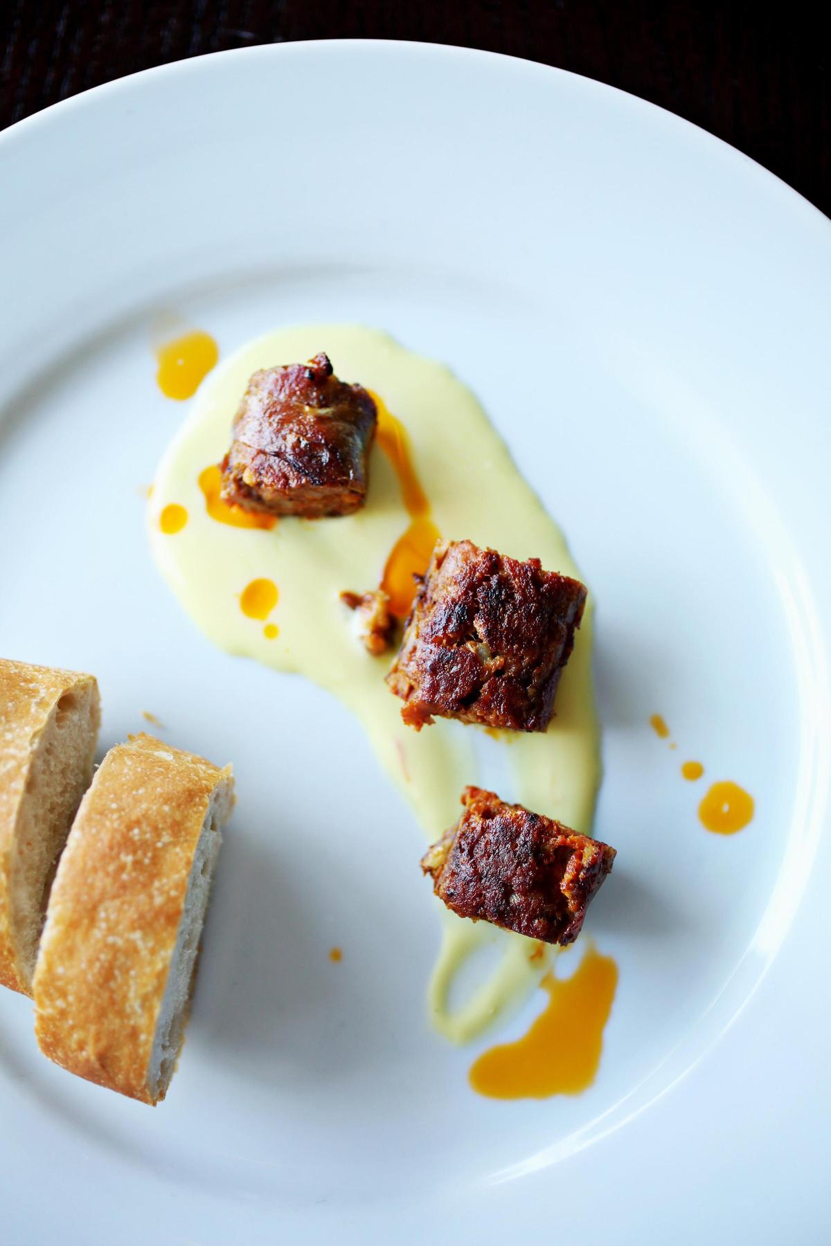 COPA’s Butifaras a lo cubano are Cuban-style sausages served with a mix of spices, including cinnamon, anis and clove atop a saffron yogurt and cucumber sauce.