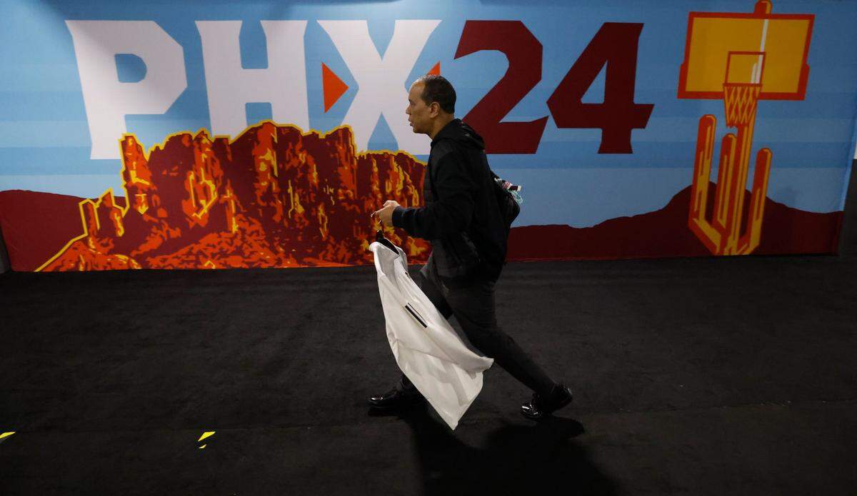 N.C. State head coach Kevin Keatts heads to the locker room before the Wolfpack’s game against Purdue in the NCAA Tournament national semfinals at State Farm Stadium in Glendale, Ariz., Saturday, April 6, 2024.