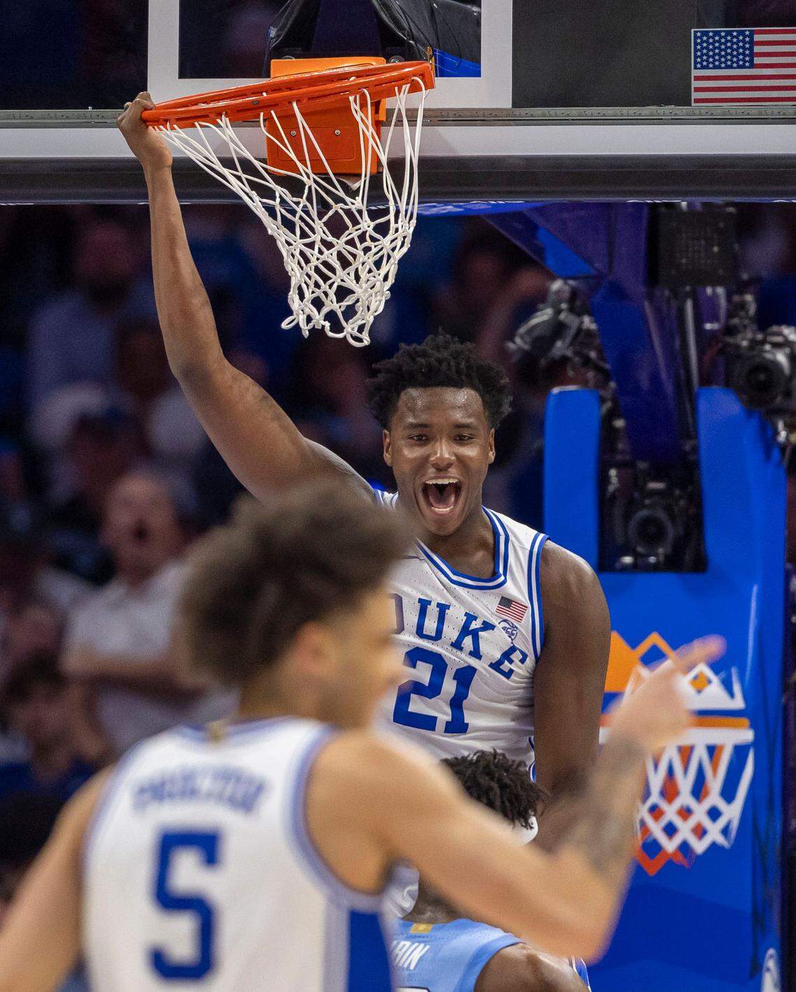 Duke’s Patrick Ngongba II (21) reacts after securing a dunk over North Carolina forward Ven-Allen Lubin (22) in the first half on Friday, March 14, 2025 during the semifinals of the ACC Tournament at Spectrum Center in Charlotte, N.C.