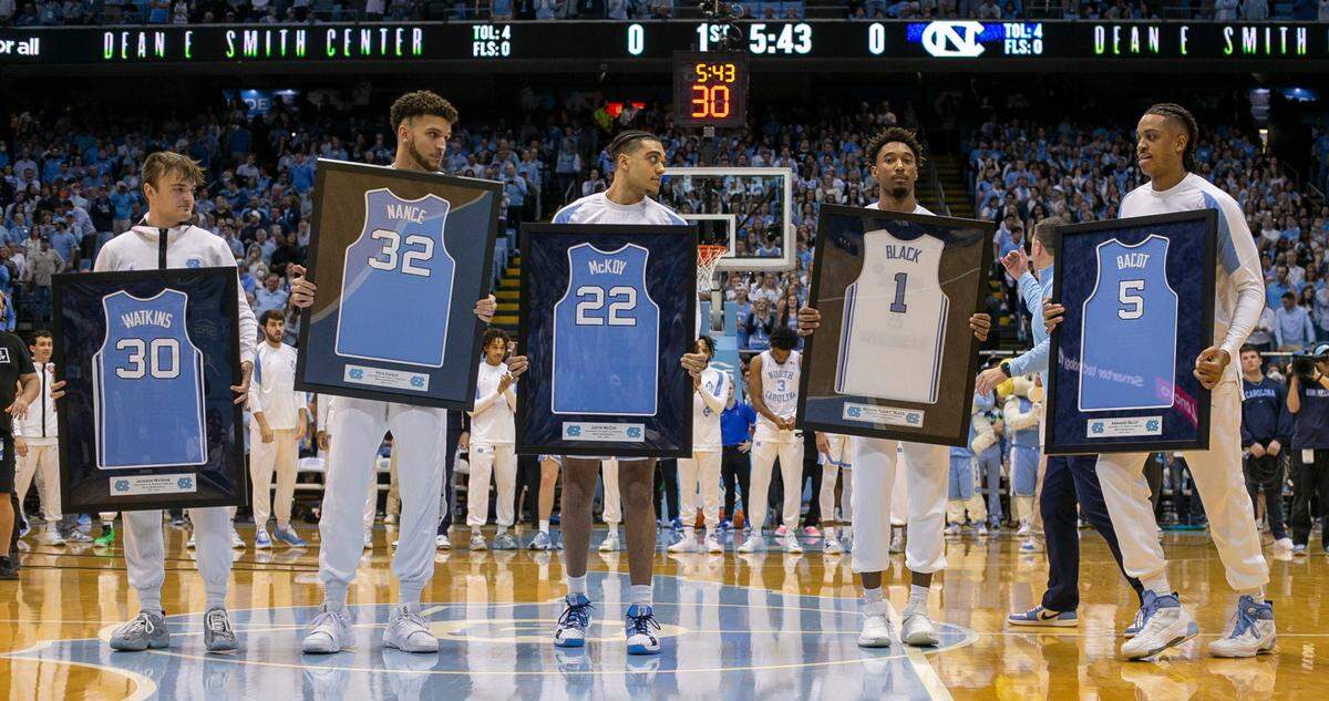 North Carolina’s Jackson Watkins (30), Pete Nance (32), Justin McKoy (22), Leaky Black (1) and Armando Bacot (5) are recognized before playing in their final game at the Smith Center prior to the tip off against Duke on Saturday, March 4, 2023 at the Smith Center in Chapel Hill, N.C.
