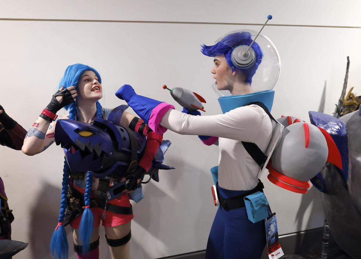 Eliza Dickens, right, talks with Tori Swallows while waiting for the costume contest during GalaxyCon Raleigh at the Raleigh Convention Center Saturday, July 26, 2025. 
