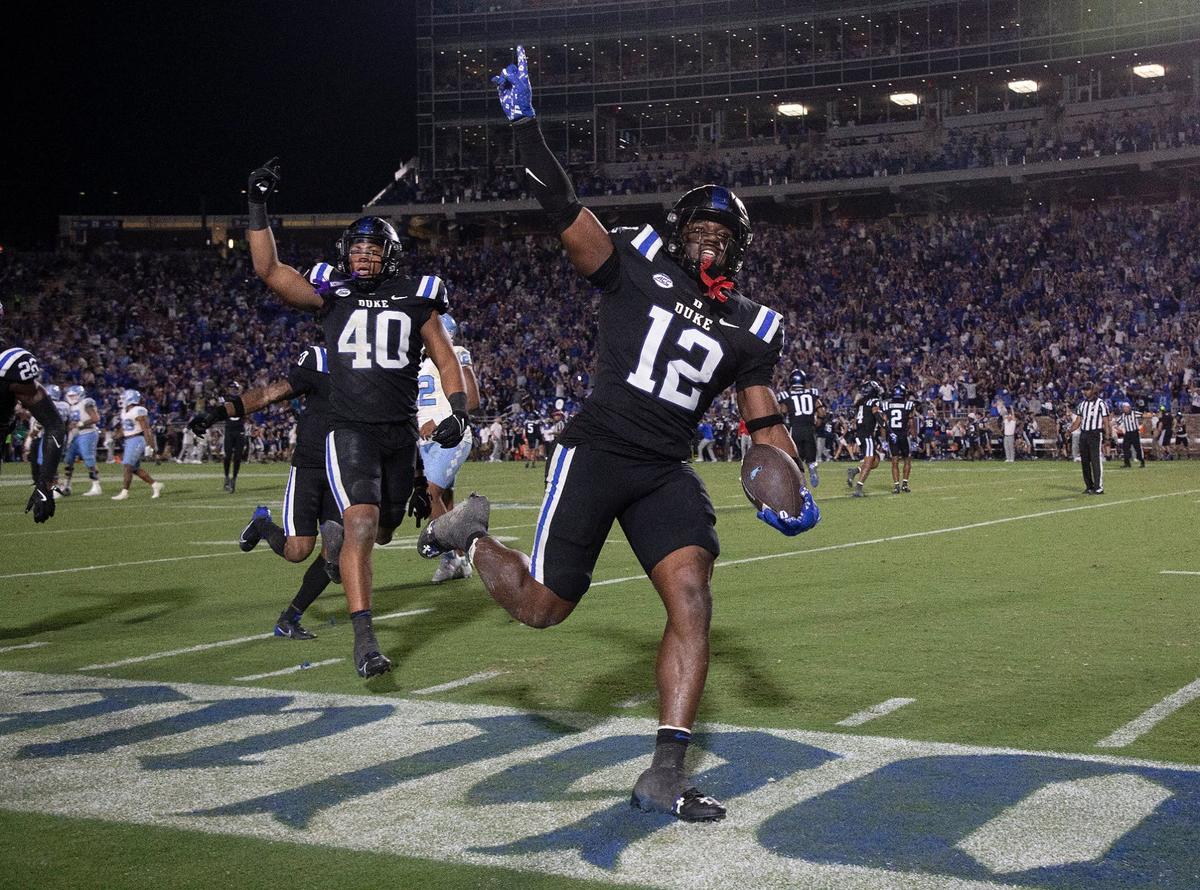 Duke’s Tre Freeman (12) reacts after making a game-winning interception in the closing minute of the Blue Devils’ 21-20 win over North Carolina on Saturday, Sept. 28, 2024, at Wallace Wade Stadium in Durham, N.C.