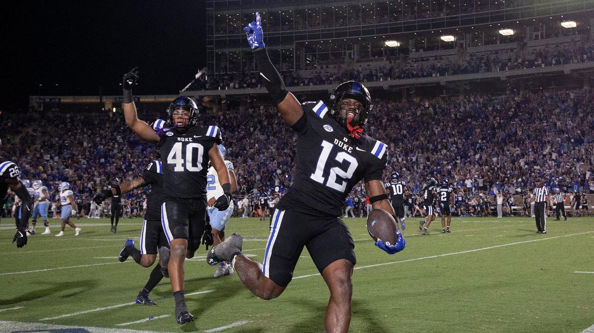 Duke’s Tre Freeman (12) reacts after making a game-winning interception in the closing minute of the Blue Devils’ 21-20 win over North Carolina on Saturday, Sept. 28, 2024, at Wallace Wade Stadium in Durham, N.C.