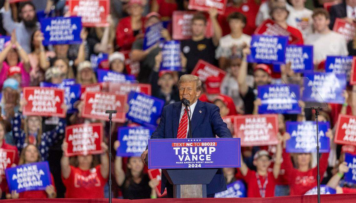 Former President Donald Trump, the Republican presidential nominee, smiles as he delivers his remarks to a packed house on Wednesday, October 30, 2024 at the Rocky Mount Event Center in Rocky Mount, N.C.