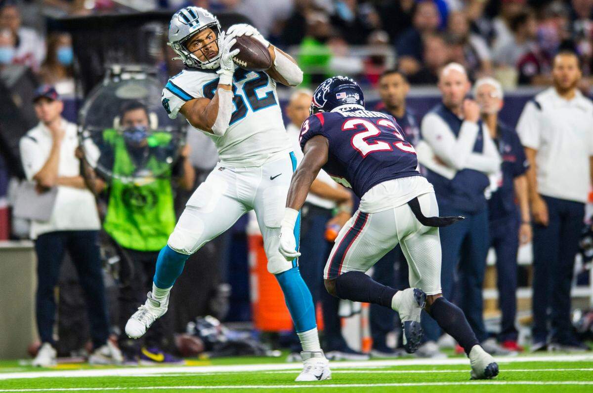 Panthers tight end Tommy Tremble, left, catches a pass as Texans defense back Eric Murray defends during the game at NRG Stadium on Thursday, September 21, 2021 in Houston, TX. The Panthers beat the Texans 24-9, giving them their third win in a row to start the season.