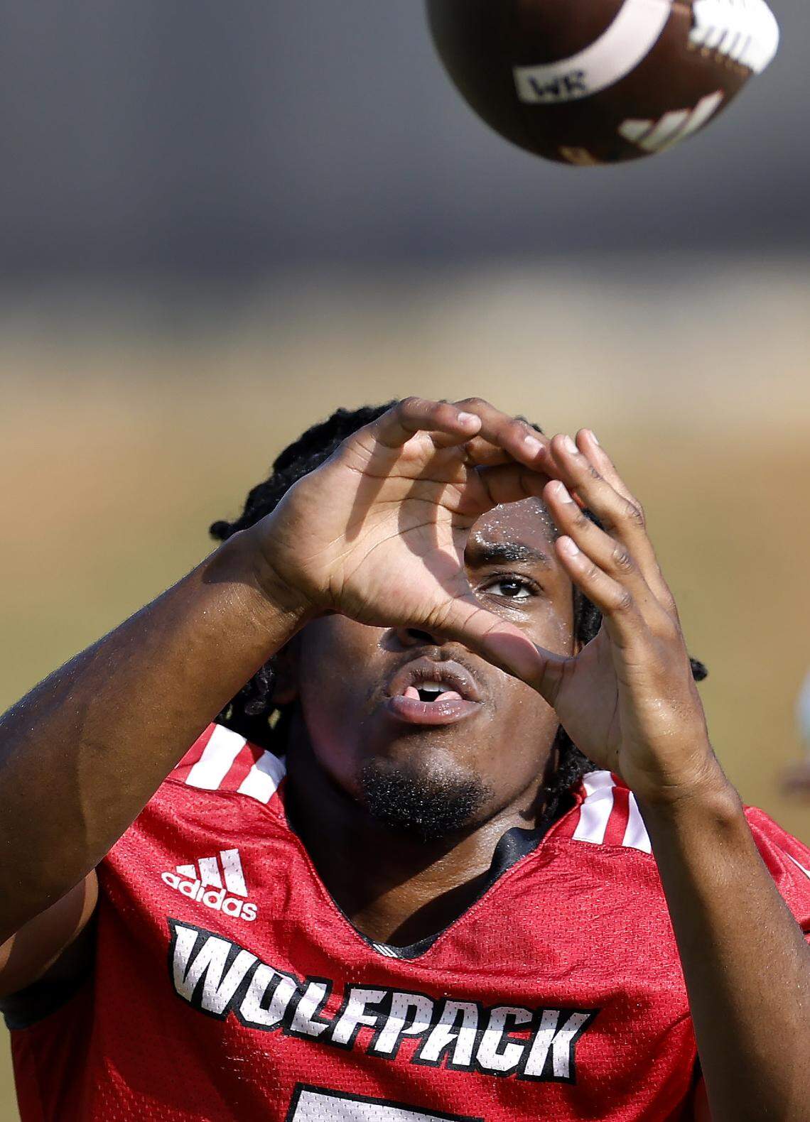 N.C. State wide receiver Noah Rogers (5) warms up before the Wolfpack’s first practice in Raleigh, N.C., Wednesday, July 31, 2024.