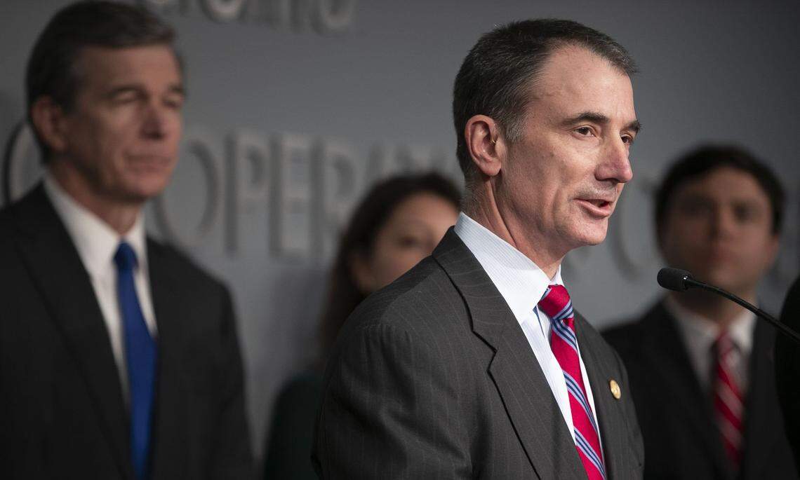 Eric Davis, chairman of the North Carolina State Board of Education addresses the closing of all schools in the state during a press briefing with Governor Roy Cooper on the COVID-19 virus on Saturday, March 14, 2020 in Raleigh, N.C. 