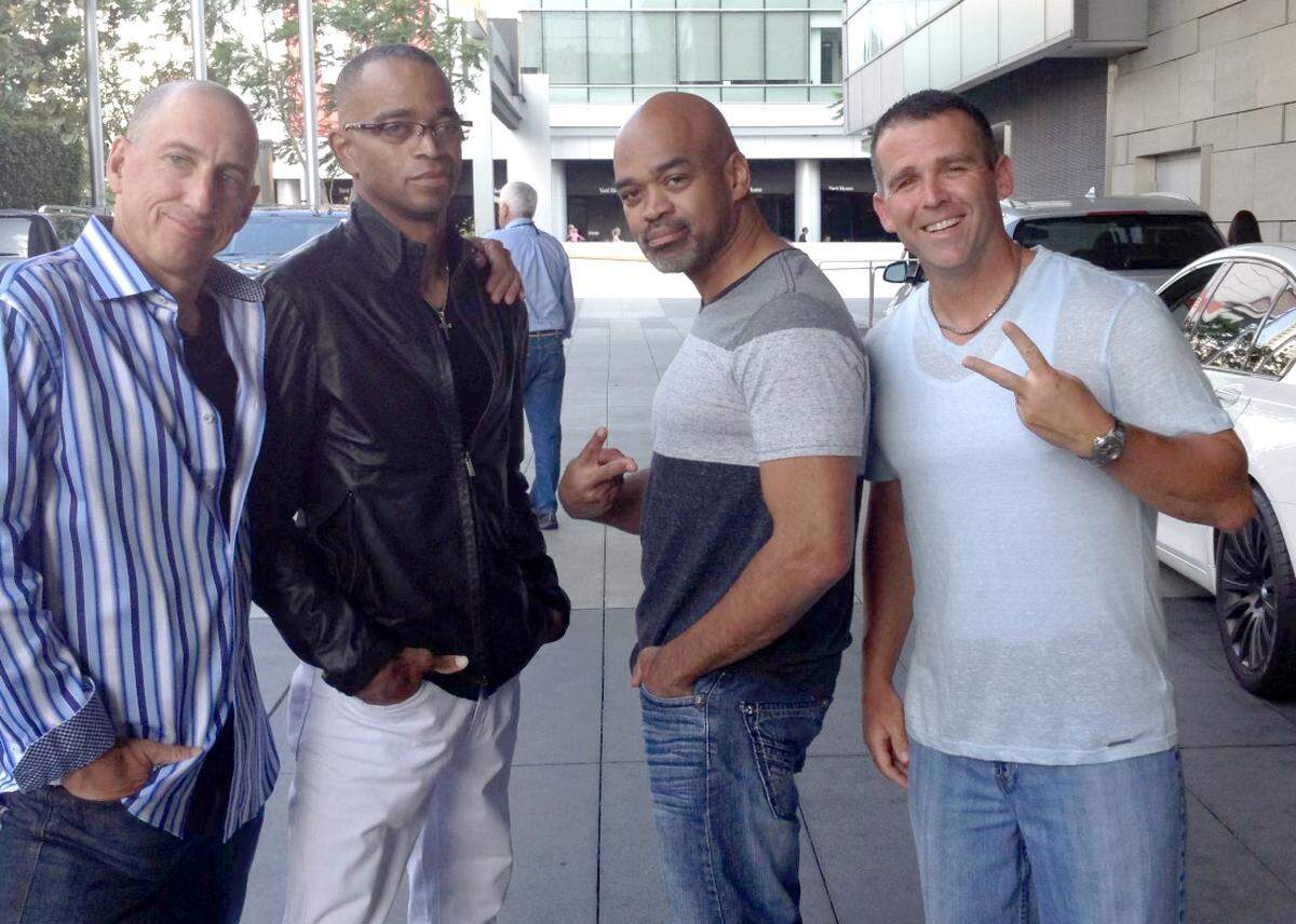 From left, Scott Organ, Stuart Scott, Stephen Scott and Brian Gallagher pose the day before the ESPYS in 2014.